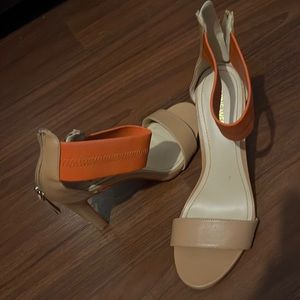 Beige with orange strap around ankle. Nine West